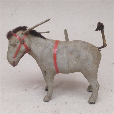 gråt-æsel-rødt-hovedtøj-optræk-roterende-hale-gammelt-legetøj