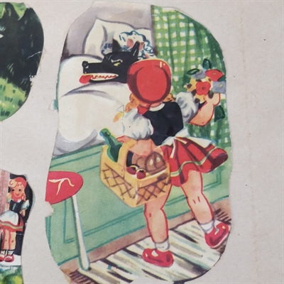 rødhætte-kurv-på-armen-ulven-i-sengen-gammelt-glansbillede