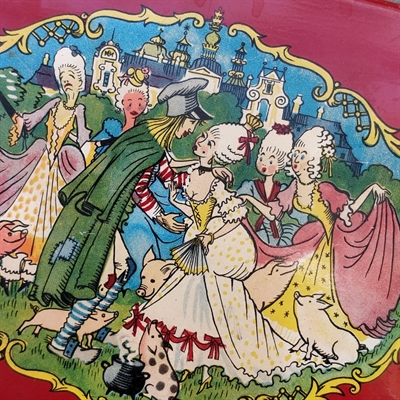 Svinedrengen på gammel metal appelsin marmeladeæske.